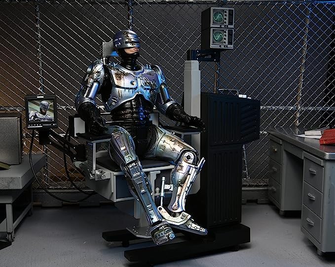 NECA - Robocop Battle Damaged Robocop w/Chair Ultimate 7" Action Figure - Image 5